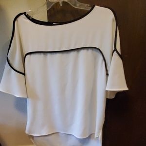 White with black lined Calvin Klein shirt